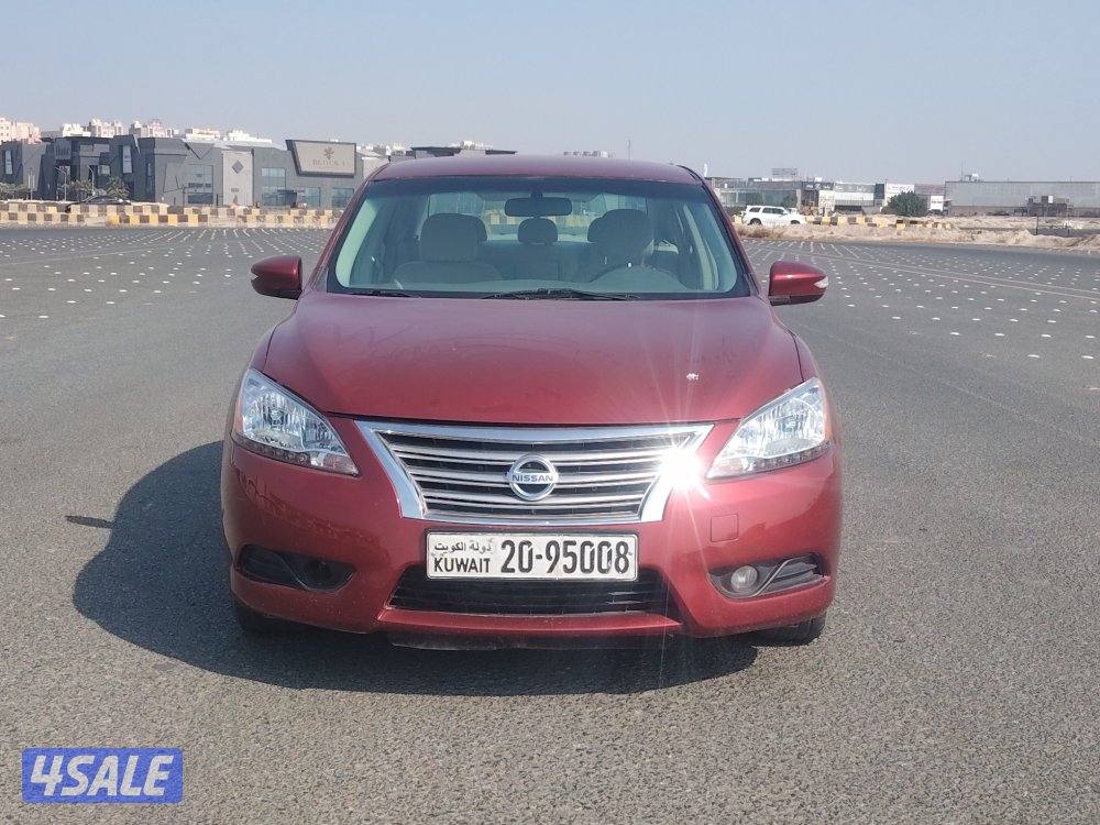 نيسان سنترا موديل٢٠١٣ عنابي عداد ٢١٤ الف بحاله ممتازة4