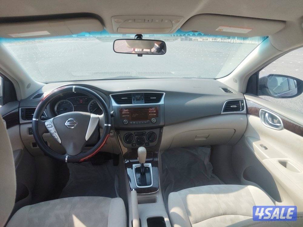 نيسان سنترا موديل٢٠١٣ عنابي عداد ٢١٤ الف بحاله ممتازة6