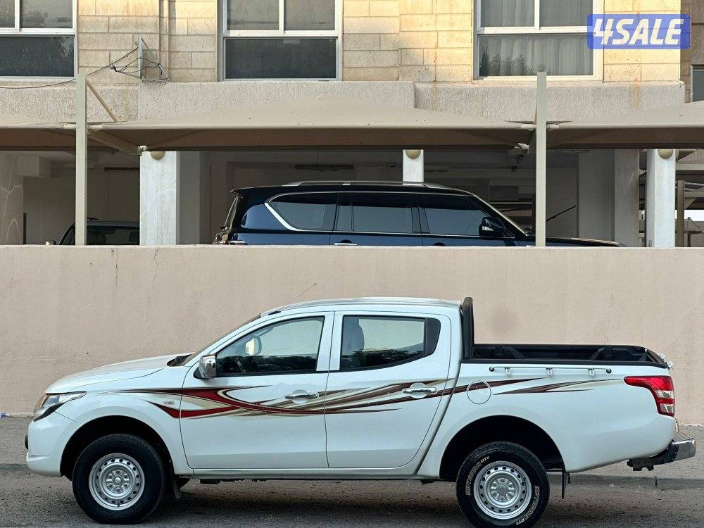 ميتسوبيشي 2018 / L2003