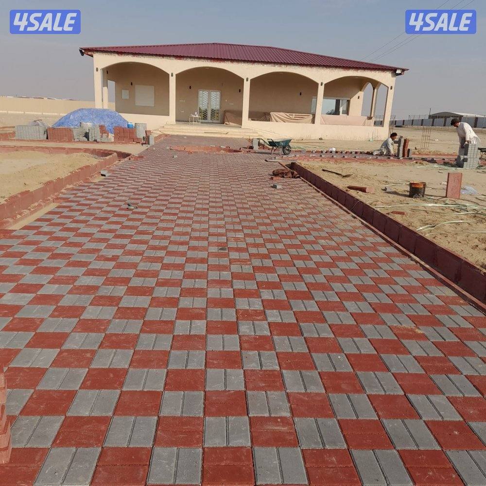 بلاط متداخل وتنسيق حدائق0