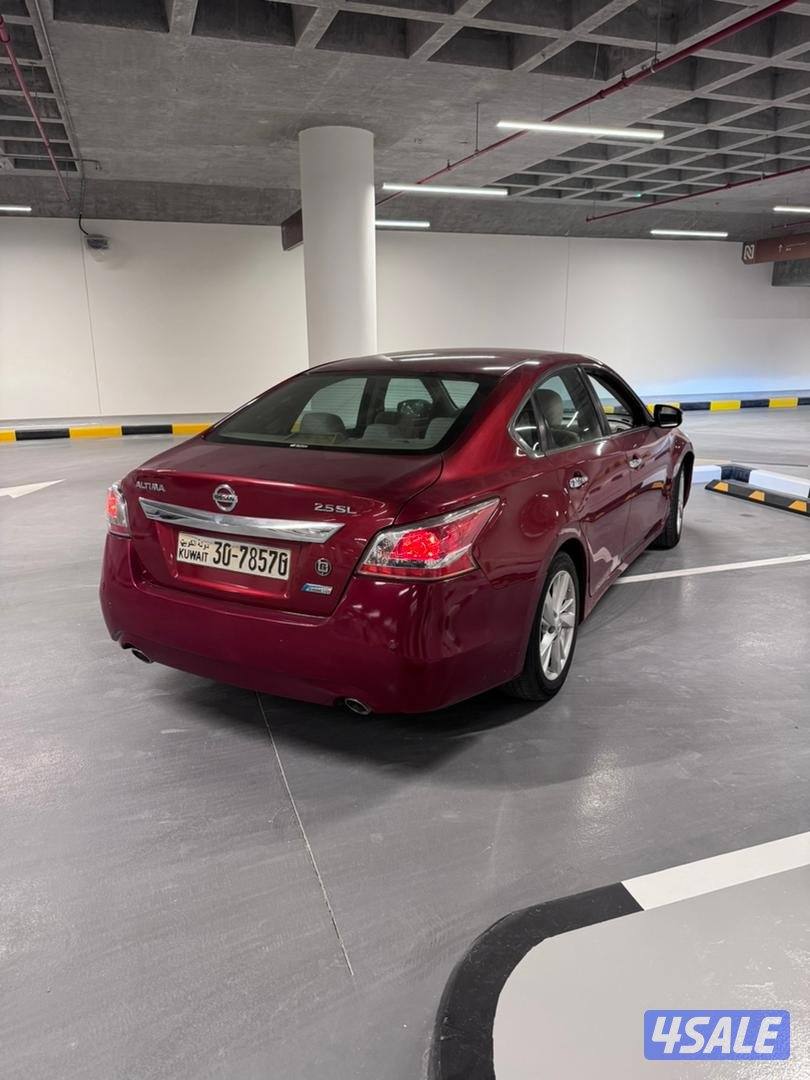 للبيع التيما 2014 ماشي 230 الف بحالة جيده شرط الفحص2