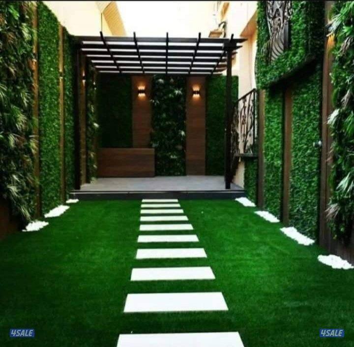 تنسيق حدائق زراع التيل الطبيعي وتركيب التيل الصناعي وقص الشجار الضخمه6