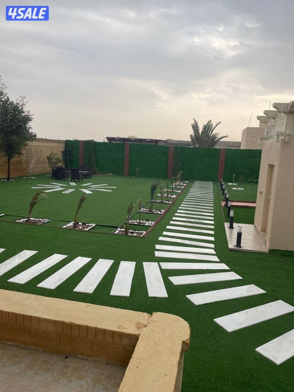 تنسيق حدائق زراع التيل الطبيعي وتركيب التيل الصناعي وقص الشجار الضخمه7