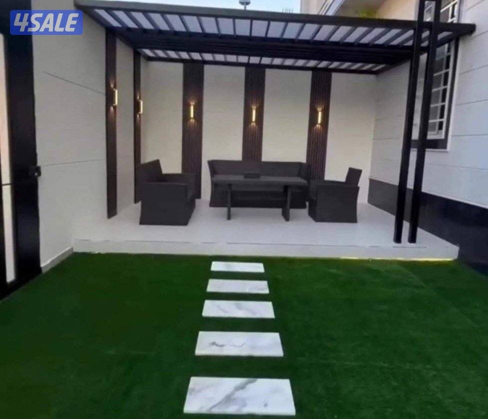 تنسيق حدائق زراع التيل الطبيعي وتركيب التيل الصناعي وقص الشجار الضخمه10