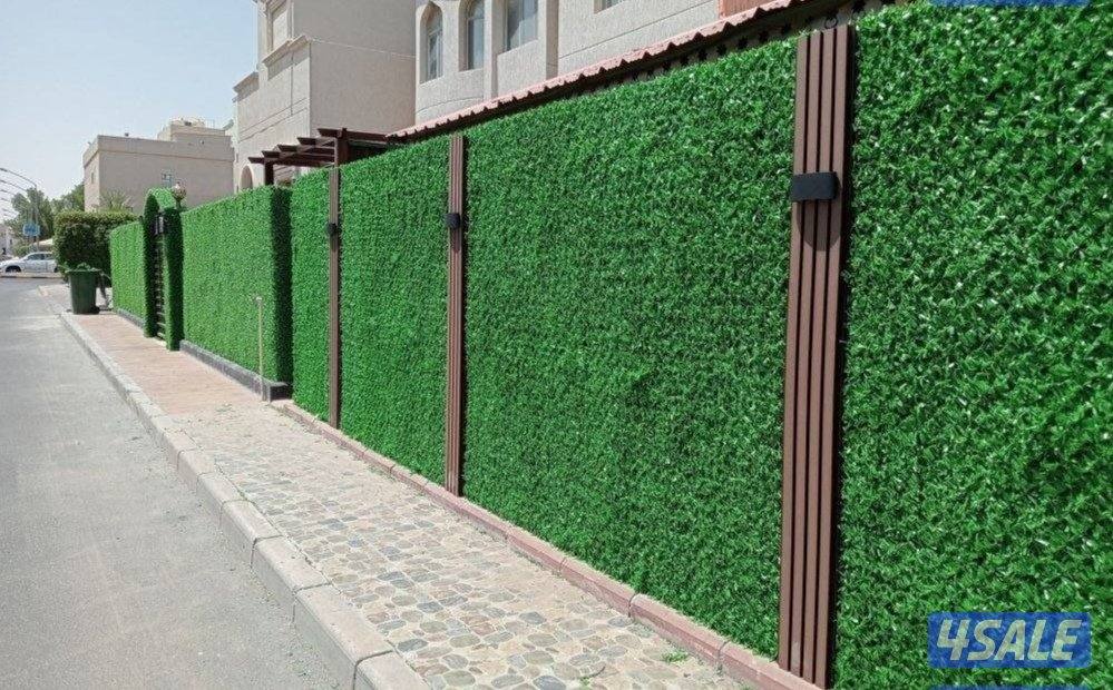 تنسيق حدائق زراع التيل الطبيعي وتركيب التيل الصناعي وقص الشجار الضخمه13