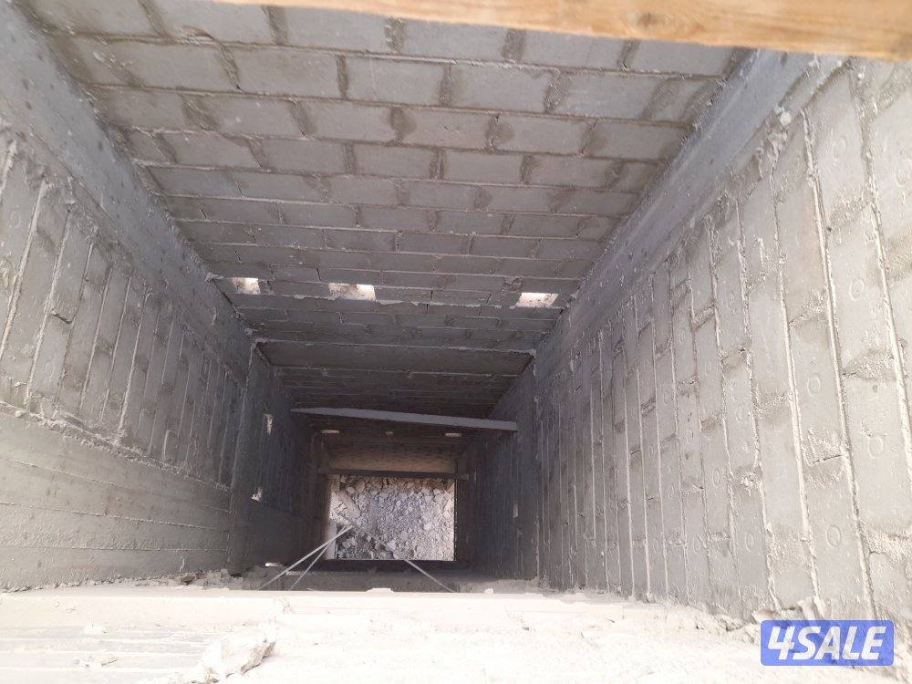 مقولات عامه بناء هيكل اسواد وبناء مصاعد خارجي وتكسير6