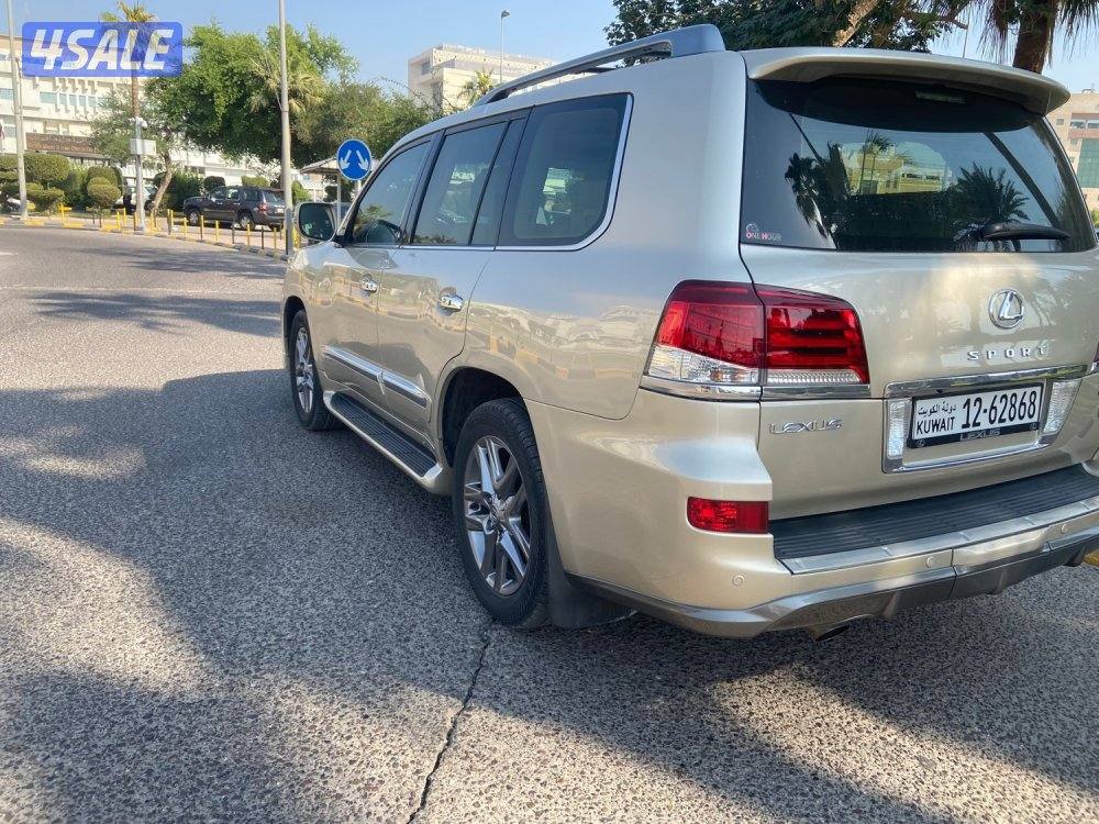 الروضة جيب لكزس LX570 بحالة ممتازة 2013 قمة بنظافة كامل امواصفات سبورت8