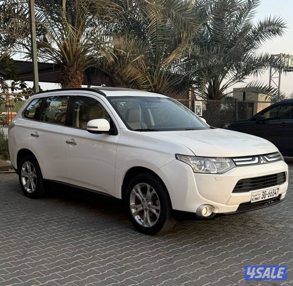 اوتلاندر موديل 2014 ماشي 135 الف كامل المواصفات شرط الفحص بالكامل0