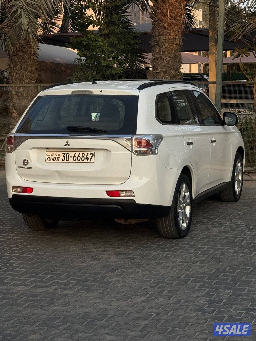 اوتلاندر موديل 2014 ماشي 135 الف كامل المواصفات شرط الفحص بالكامل3