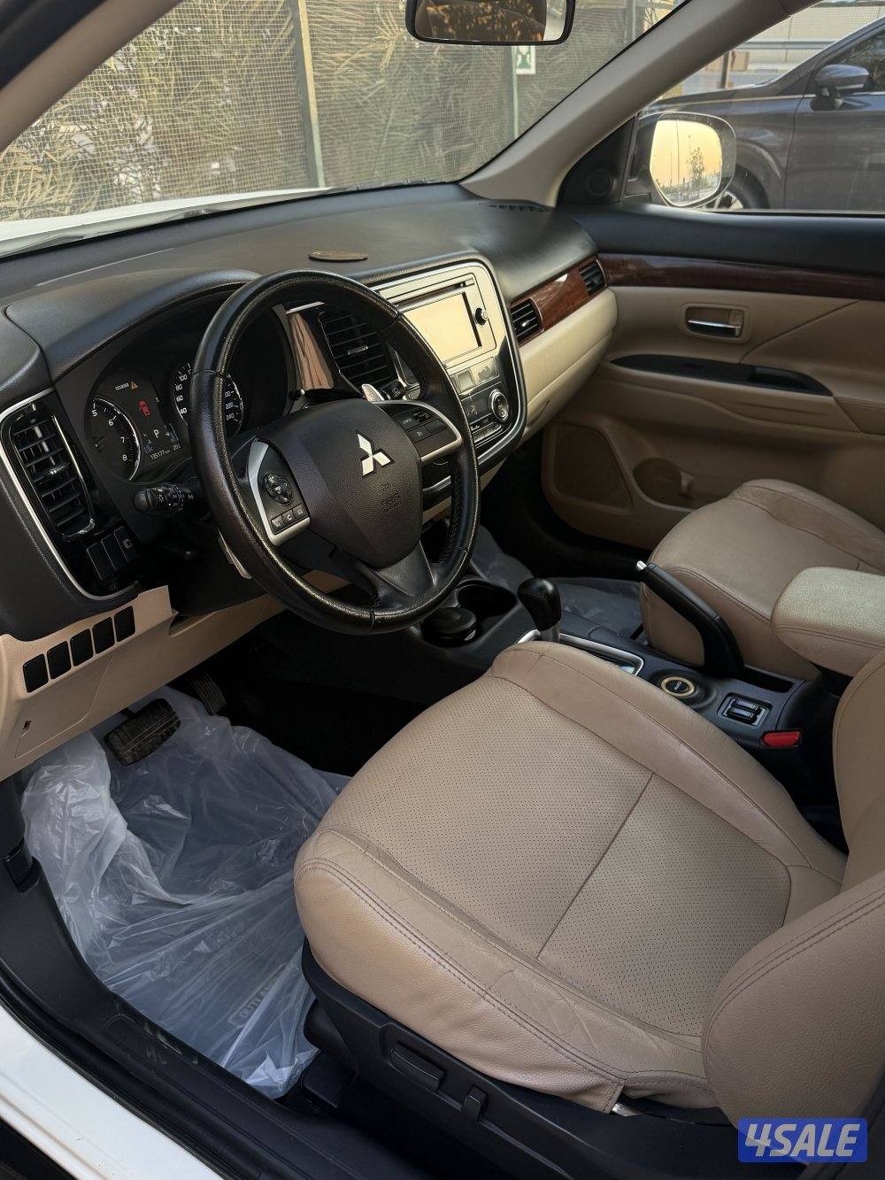 اوتلاندر موديل 2014 ماشي 135 الف كامل المواصفات شرط الفحص بالكامل4