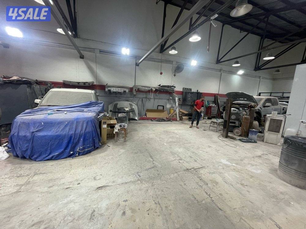 للبيع كراج مجهز بكامل معداته صبغ و حداده كراج مساحه كبيره 320متر3