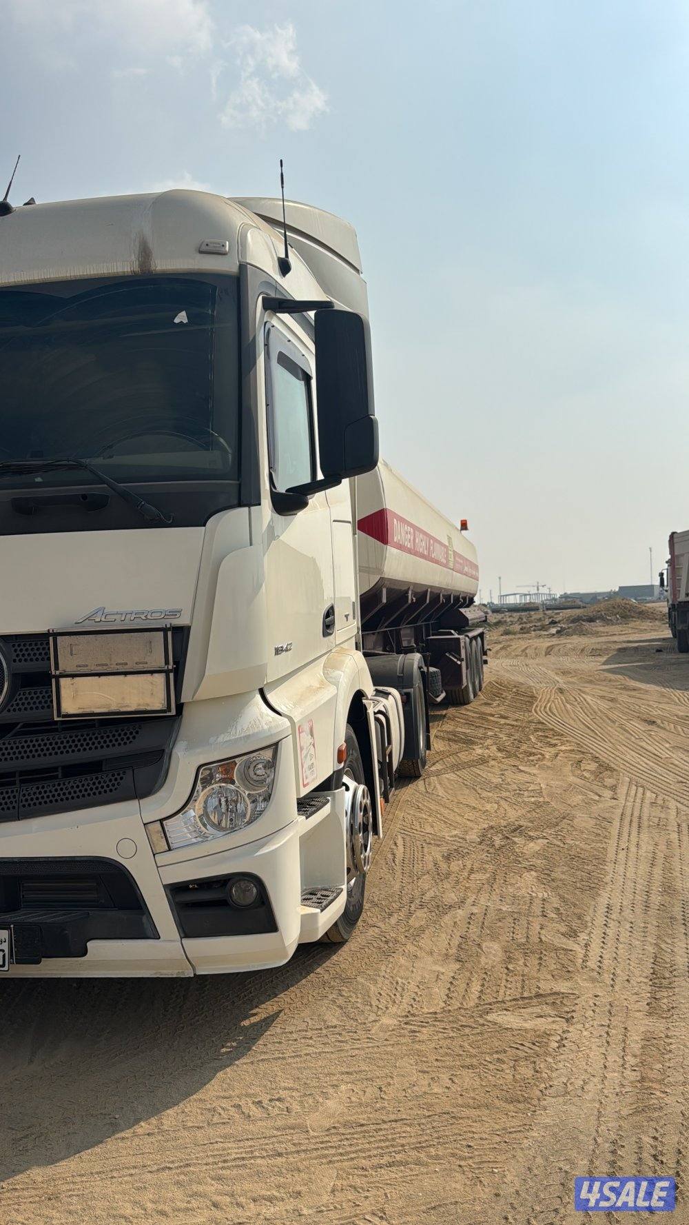 راس مع تنكر1