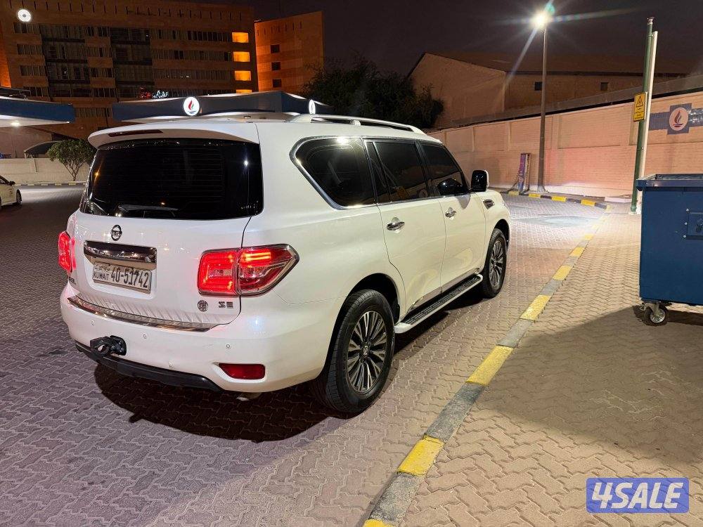 للبيع نيسان باترول 6 سلندر ابيض صدفي موديل 20175