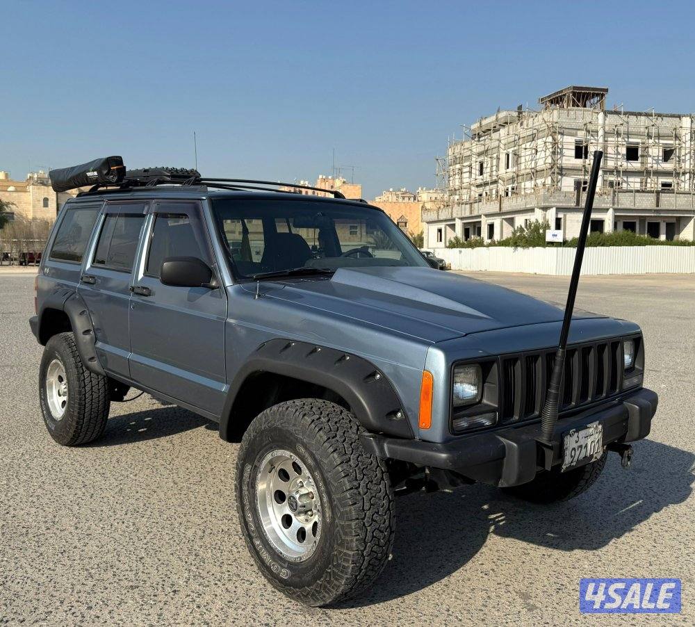 بحالة ممتازة جيب شروكي 1997 قير اتوماتيك دبل قير مجهز رحلات مسجل بدفتر3