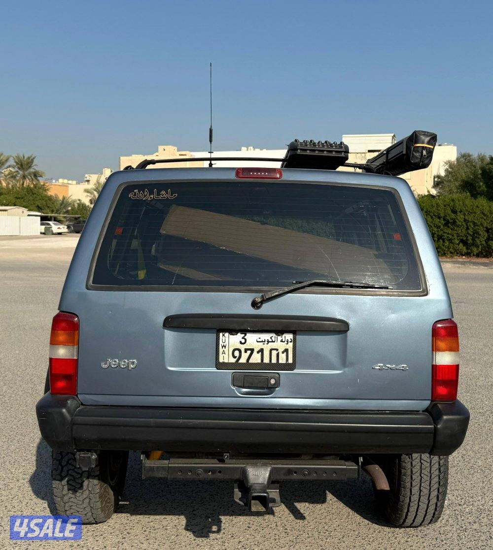 بحالة ممتازة جيب شروكي 1997 قير اتوماتيك دبل قير مجهز رحلات مسجل بدفتر6