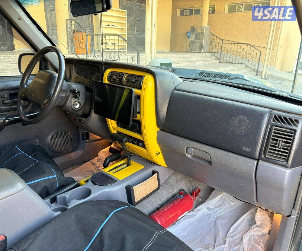 بحالة ممتازة جيب شروكي 1997 قير اتوماتيك دبل قير مجهز رحلات مسجل بدفتر9