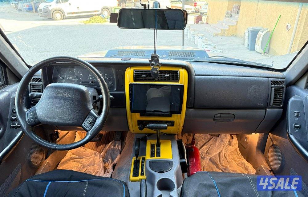 بحالة ممتازة جيب شروكي 1997 قير اتوماتيك دبل قير مجهز رحلات مسجل بدفتر10