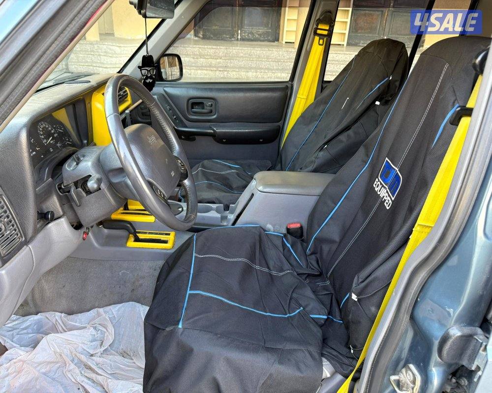 بحالة ممتازة جيب شروكي 1997 قير اتوماتيك دبل قير مجهز رحلات مسجل بدفتر11