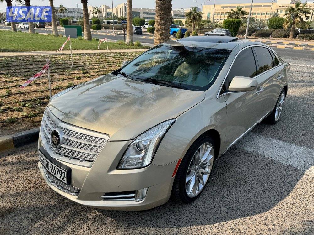 كاديلاك XTS 4 بلاتينيوم 2013 ماشي 40 سيرفس وكاله نظيف جدا شرط الفحص0