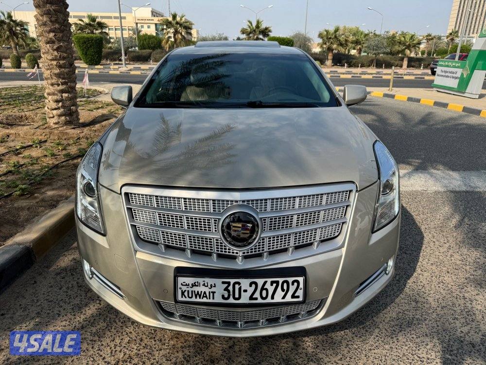 كاديلاك XTS 4 بلاتينيوم 2013 ماشي 40 سيرفس وكاله نظيف جدا شرط الفحص1