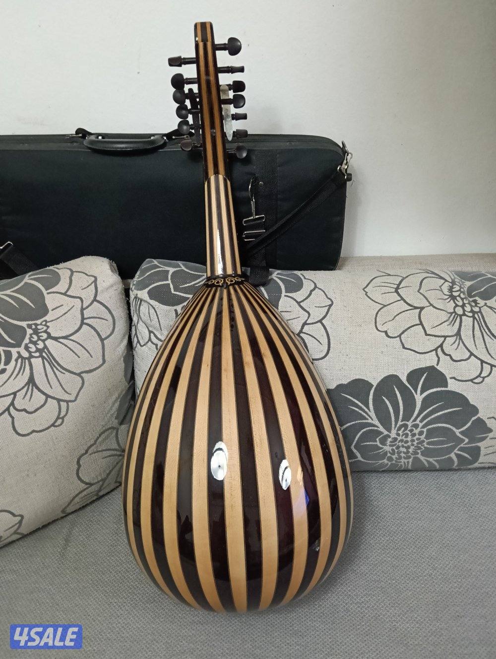 تعليم العزف لآله العود والبيانو لطلبةالمعهدوالتربية الاساسية4