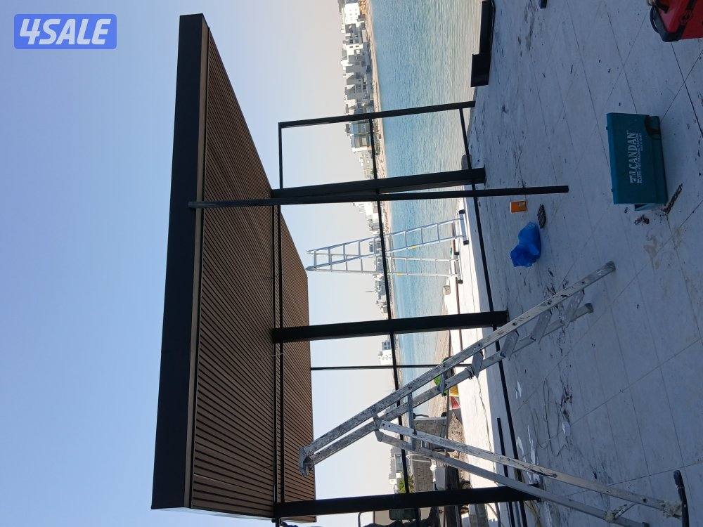 حداد عام مظلات سيارات وتنسيق حدائق ومضلات وثيل صناعي وبديل خشب12