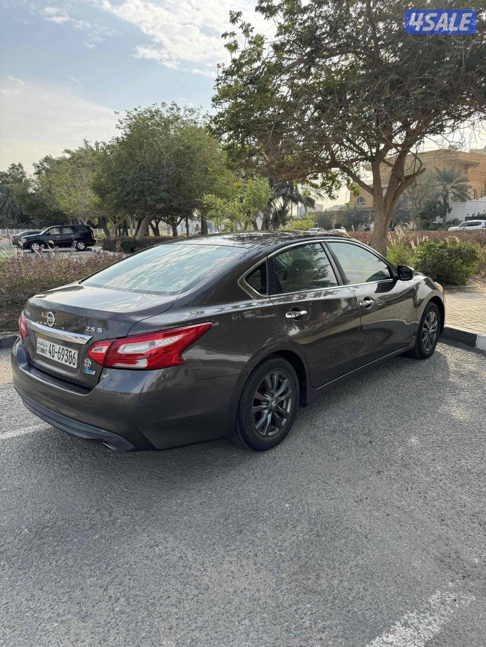 نيسان التيما (شرط الفحص) بحاله ممتازة2