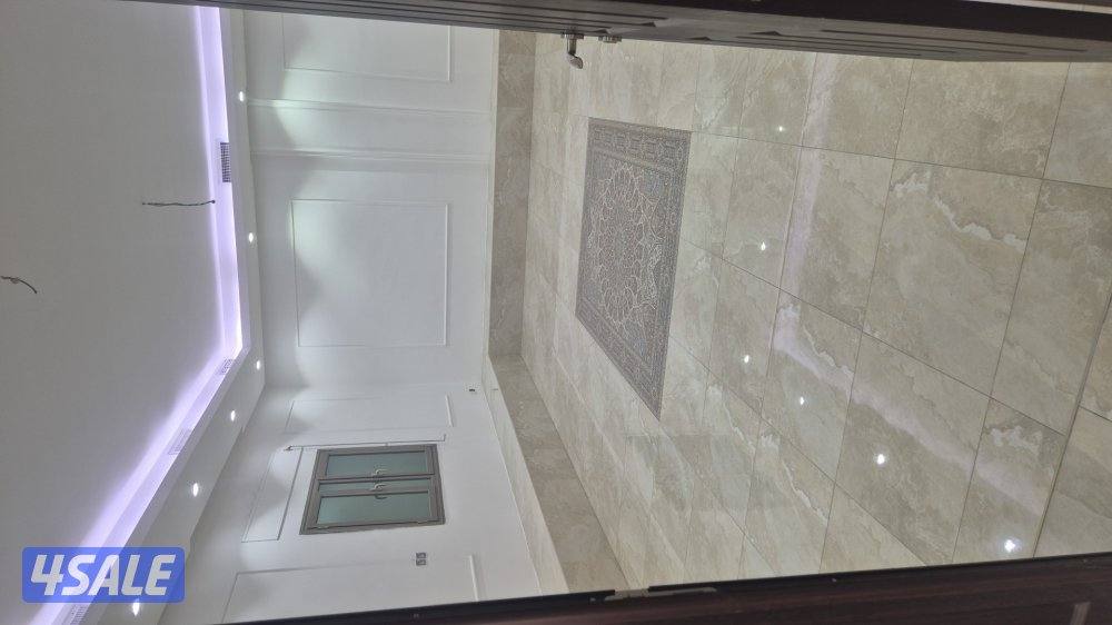 للبيع قسيمه بصباح الاحمد دورين ونصف زاويه ديوانيه ومقلط تشطيب ديلوكس12