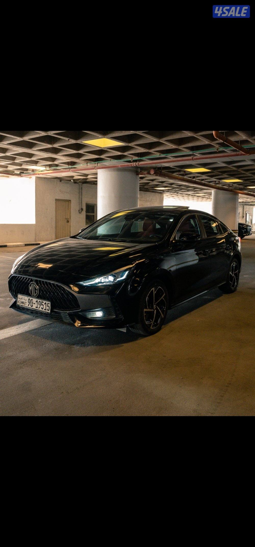 ام جي GT موديل 2025 اللون اسود من الداخل اسود بأحمر1