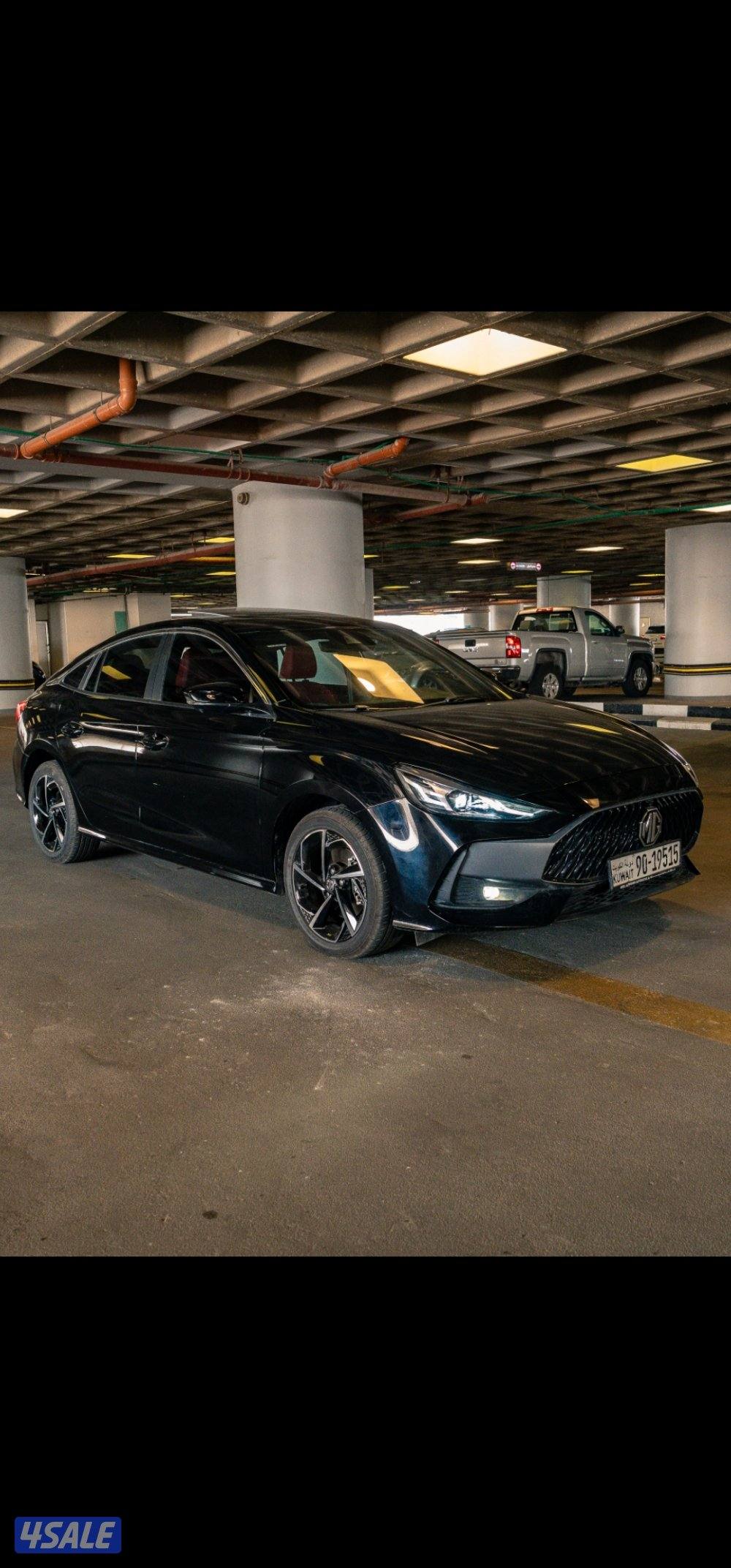 ام جي GT موديل 2025 اللون اسود من الداخل اسود بأحمر2