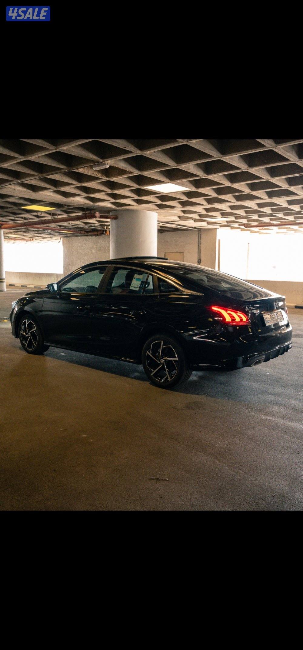 ام جي GT موديل 2025 اللون اسود من الداخل اسود بأحمر4