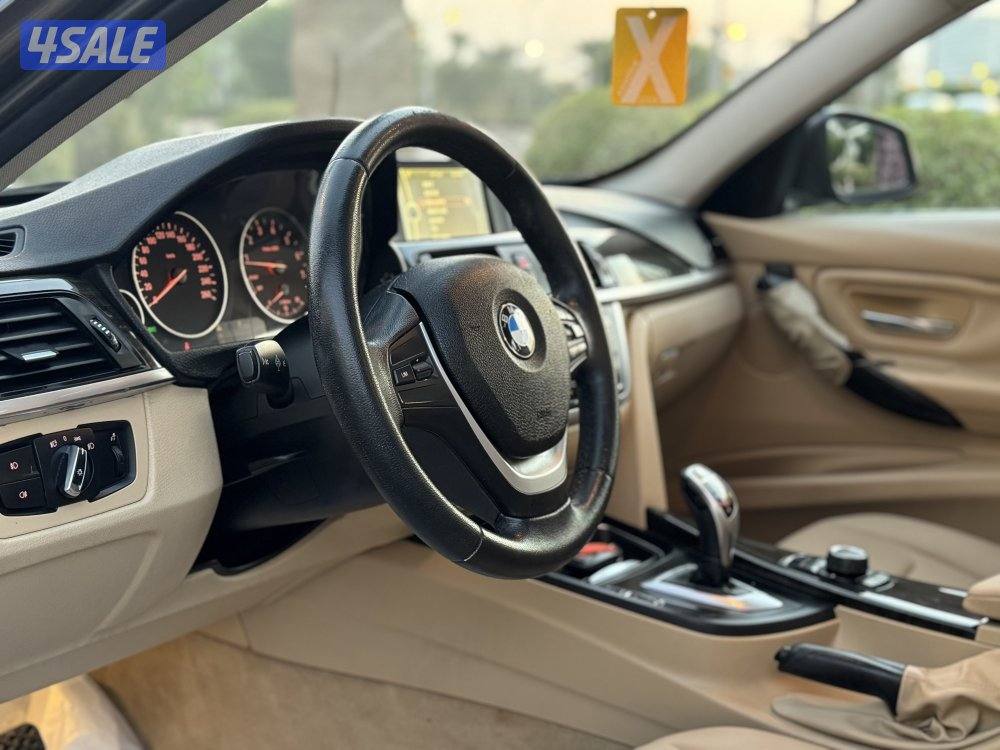 BMW 320i Luxury موديل 2014 بحاله ممتازه جدا11