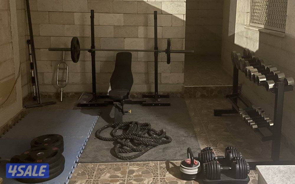 a Home full gym bench press bar dumbbells two stands0