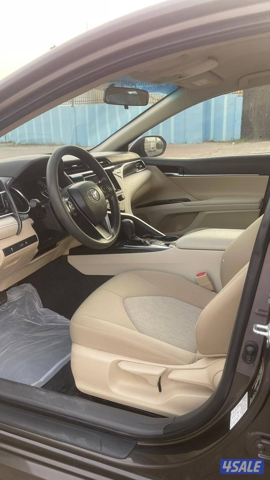 كامري 2018. ماشي 180 الف شرط الفحص بالكامل عدا قطعه6