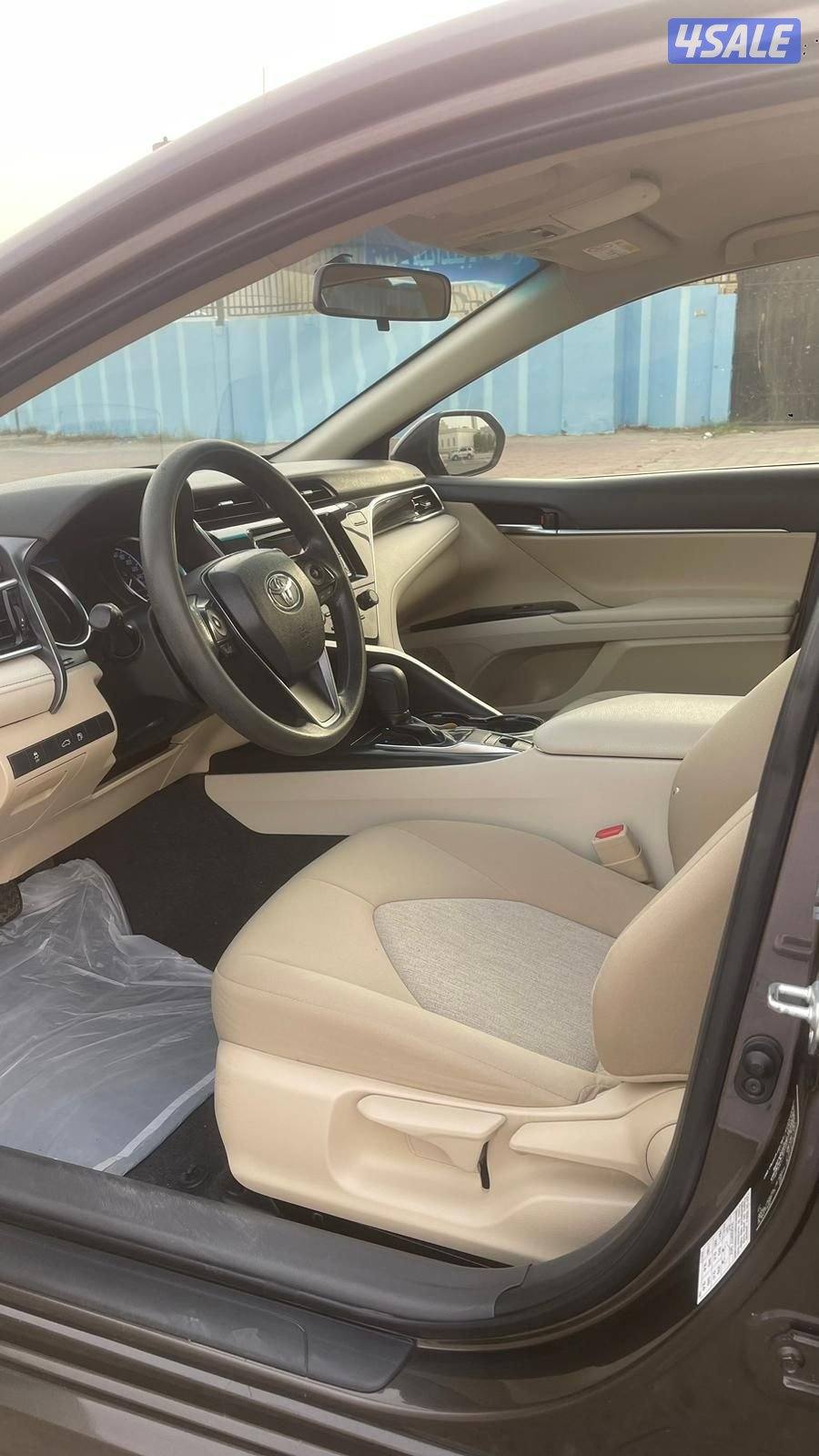 كامري 2018. ماشي 180 الف شرط الفحص بالكامل عدا قطعه8