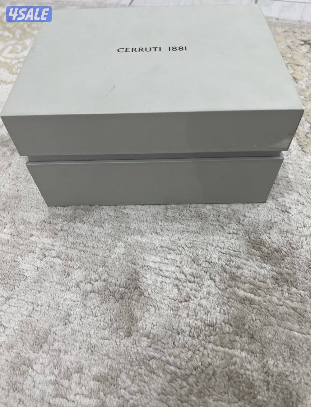 قلم وساعة من ماركة شيروتي الإيطالية ( أصل وليس تقليد ) في حالة جيده0