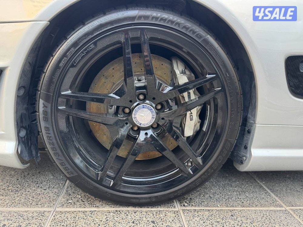 SL63 AMG / اصدار خاص 1 من 100 سيارة بالعالم7