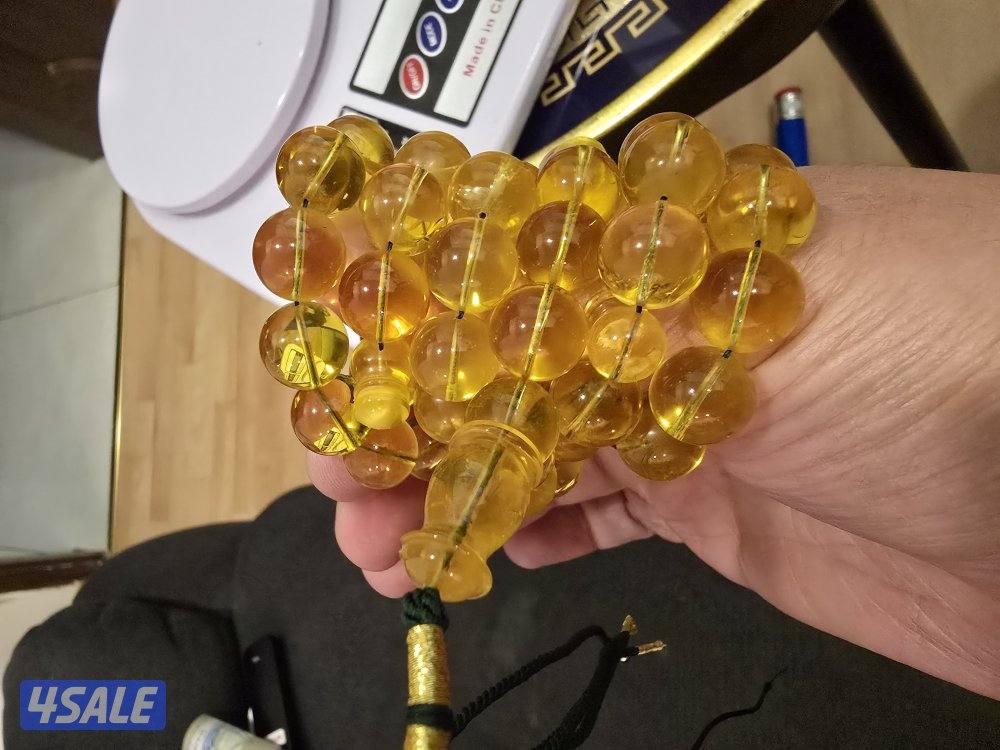 كهرب شفاف،  ٥٥ خرزة، ١١.٥ مل، الوزن ٦٠ غرام0