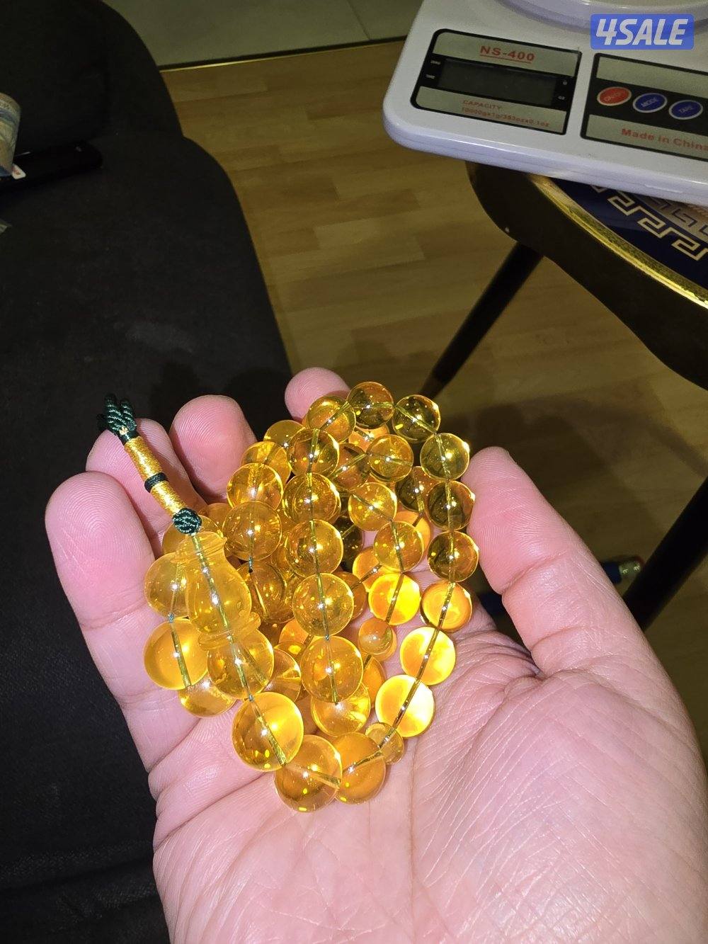 كهرب شفاف،  ٥٥ خرزة، ١١.٥ مل، الوزن ٦٠ غرام1