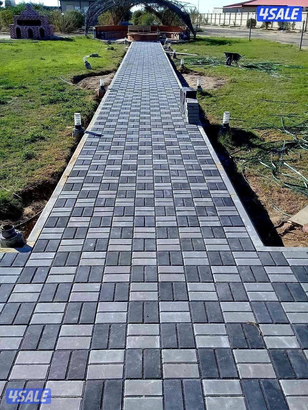 معلم بلاط متداخل وتنسيق حدائق1