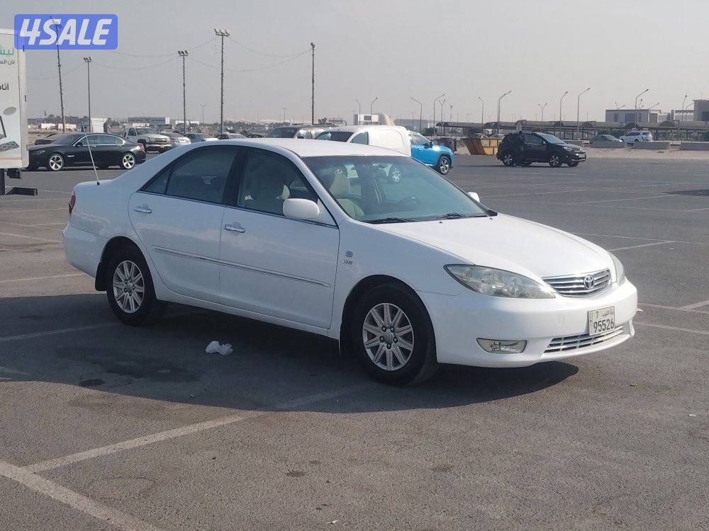 كامري GLI موديل ٢٠٠٤ ابيض عداد ٣٢٦ الف بحاله جيده جدا1