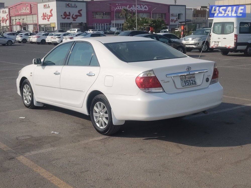 كامري GLI موديل ٢٠٠٤ ابيض عداد ٣٢٦ الف بحاله جيده جدا2