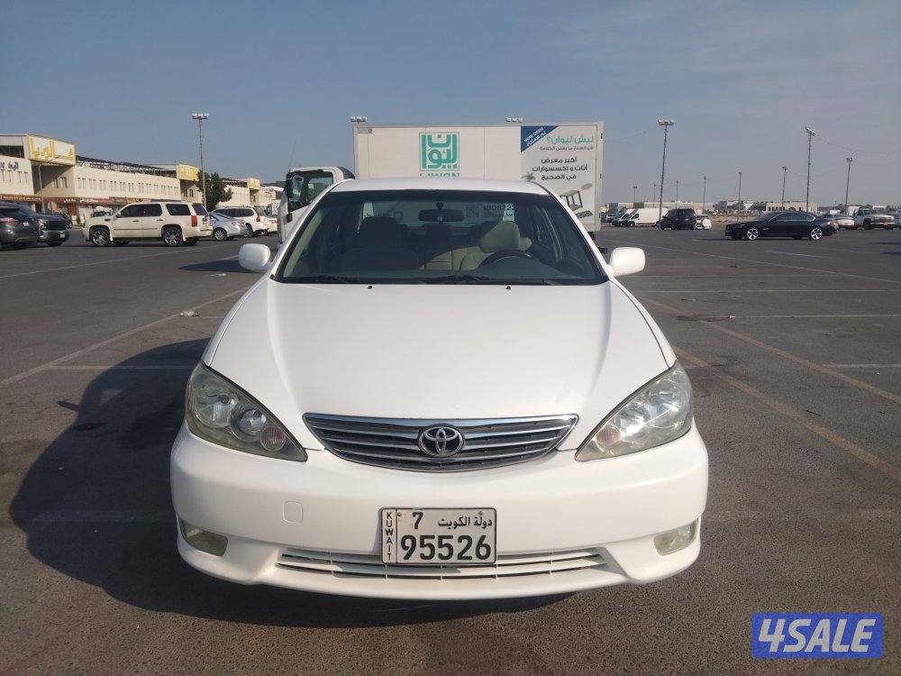 كامري GLI موديل ٢٠٠٤ ابيض عداد ٣٢٦ الف بحاله جيده جدا3