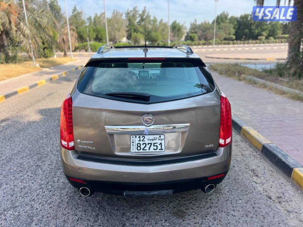 جيب كدلاك SRX موديل ٢٠١٢ بحاله نظيفه درجه اولي عداد ١٤٠ الف2