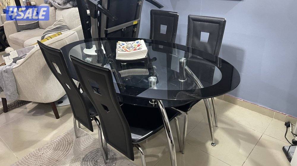 طاولة طعام 2 رف زجاجي + اربع كراسي0