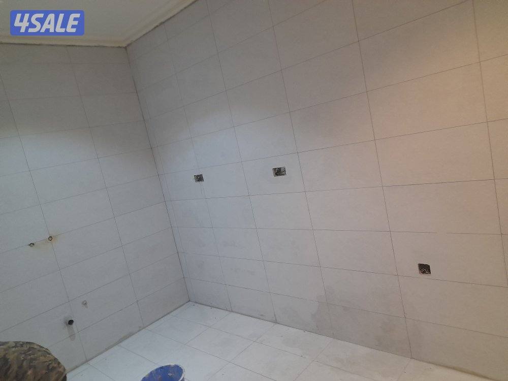 معلم باكستاني تركيب سيراميك بلاط جرانيت14