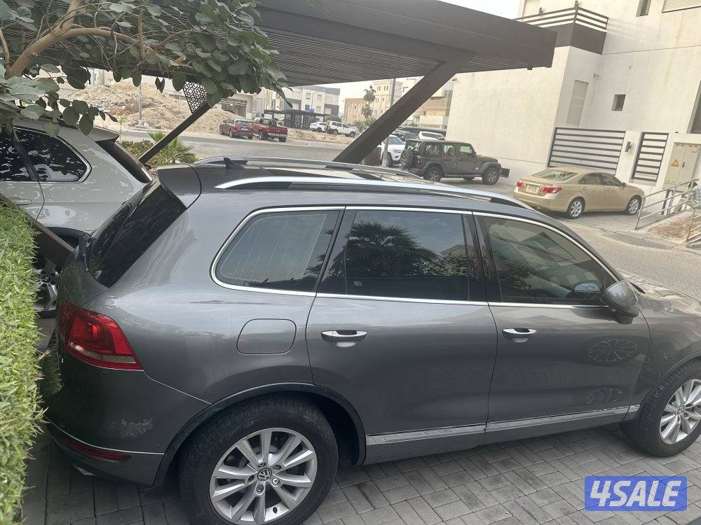 طوارق موديل ٢٠١٤ بانوراما اللون رصاصي غامق ومن الداخل جلد بيج ماشي ١٦٥0