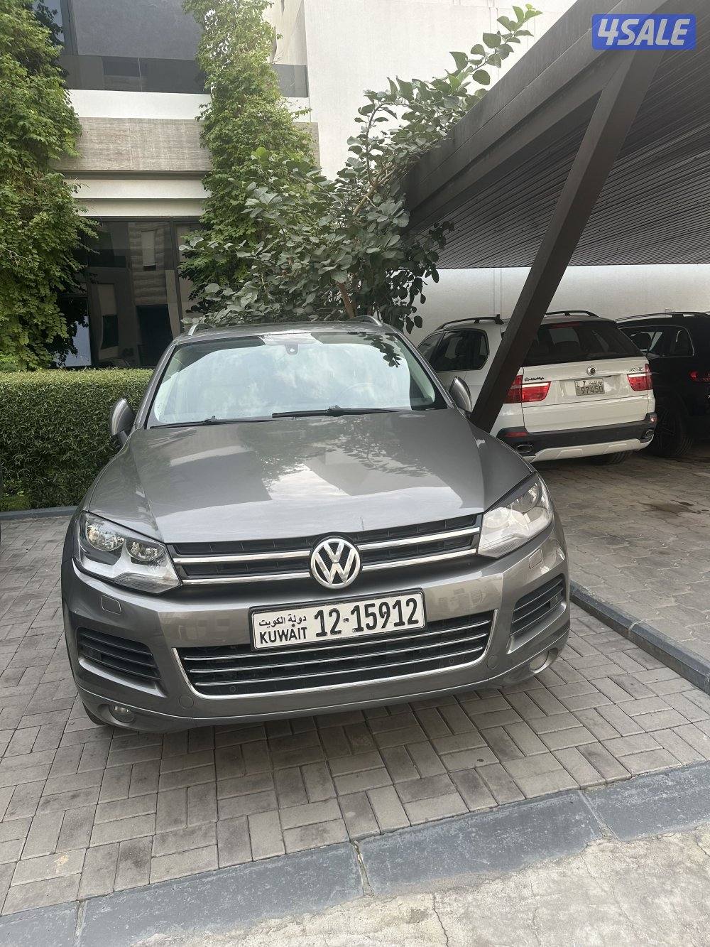 طوارق موديل ٢٠١٤ بانوراما اللون رصاصي غامق ومن الداخل جلد بيج ماشي ١٦٥1