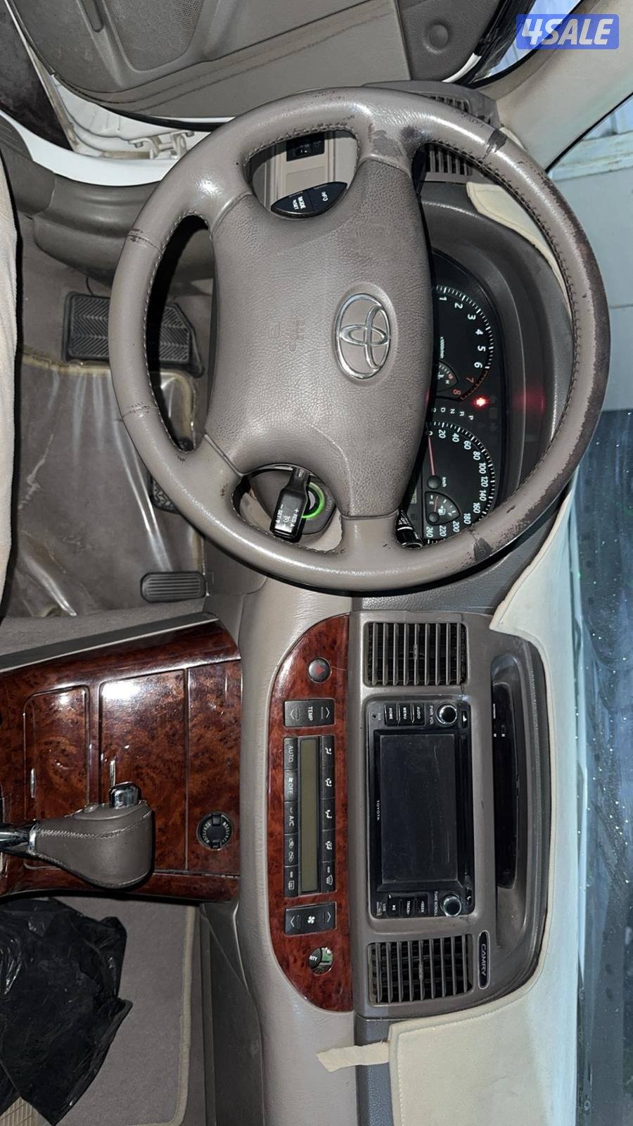 كامري 2006 صبغ الوكاله بحاله جيده في باب السايق حكه خفيفه2