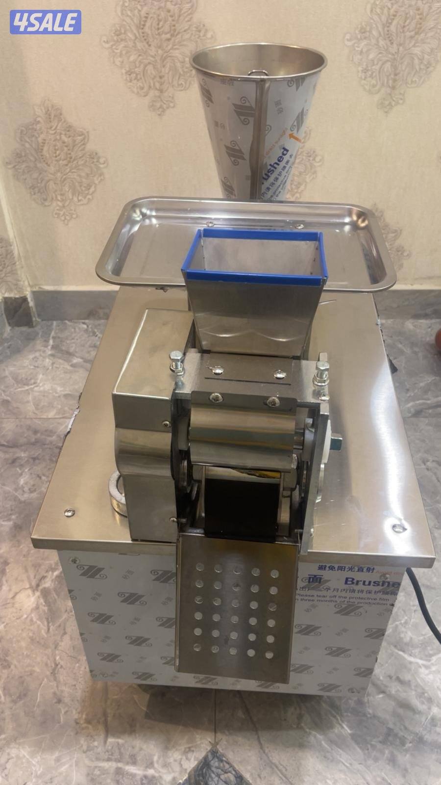 آلة سمبوسة البف و العجانة1